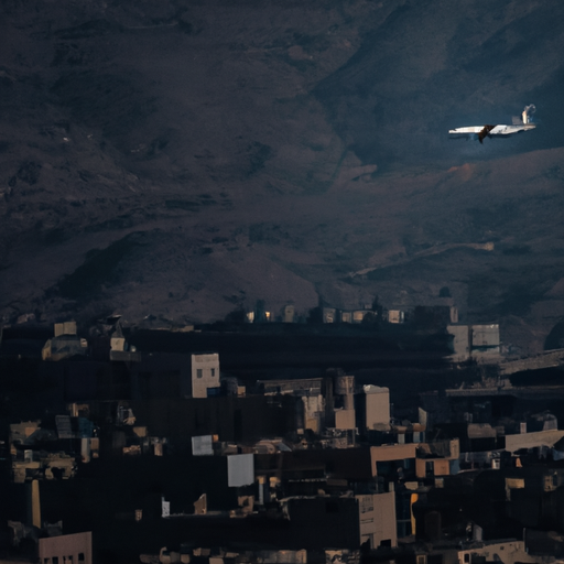 תמונה של מטוס טס מעל הנוף העירוני התוסס של ירדן.
